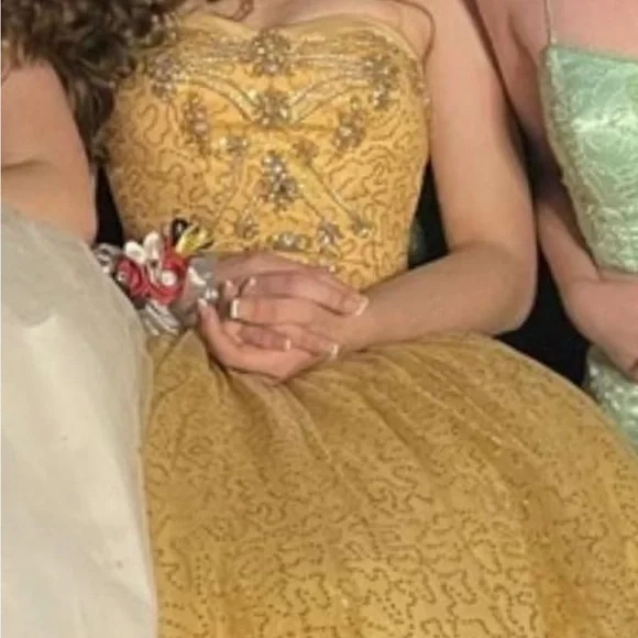 This is a prom dress! Size 4 worn once, there is a jewel coming off easy fix!! - Picture 3 of 3